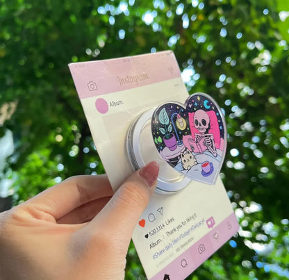 Skeleton & Cat Magnetic Phone Stand: Cute Heart-Shaped Phone Grip, Nighttime Skeleton Reading with Cat, Kawaii Magsafe Phone Holder